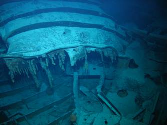 Large pieces of twisted steel plate and ribs on seabed